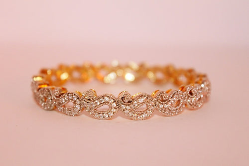 Pulseras y Anillos Chapados Oro 18K